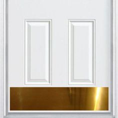 a white door with gold trim and two doors