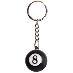 a keychain with a black and white eight ball on the end of it