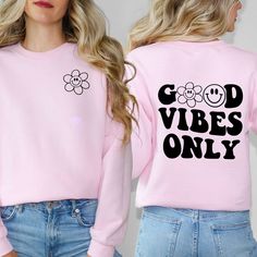 Looking for a cute versatile top to wear? Make sure to grab one of our Graphic Sweatshirts! This soft and comfortable shirt is the perfect top for any outfit. It can be paired with biker shorts, Jeans, or the classic stay at home sweats! This sweatshirt is true-to-size, so be sure to order your regular size! If you are looking for a more oversized look, make sure to size up. Comfortable Long Sleeve Tops With Text Print, Pink Slogan Top For Fall, Cute Long Sleeve Tops For Everyday, Pink Tops With Funny Print For Loungewear, Cute Long Sleeve Tops With Text Print, Trendy Long Sleeve Comfortable T-shirt, Funny Print Crew Neck Top For Everyday, Cute Slogan Tops In Relaxed Fit, Pink Top With Funny Print For Loungewear