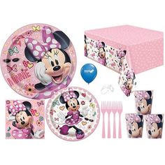 a minnie mouse birthday party set with plates and napkins