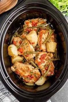 chicken, potatoes and green beans in a slow cooked crockpot with parsley