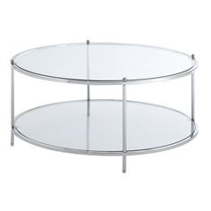 a round glass table with metal legs and a clear top on an isolated white background