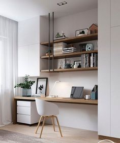 a room with a desk, chair and bookshelf next to a large window