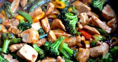 chicken and broccoli stir fry in a skillet