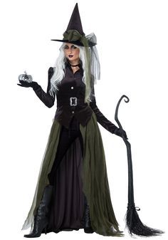 a woman dressed as a witch holding a broom and wearing a black dress with white hair