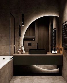 a bathroom with a sink, mirror and bathtub in it's center area