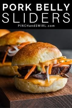 two pork belly sliders with cheese and onions