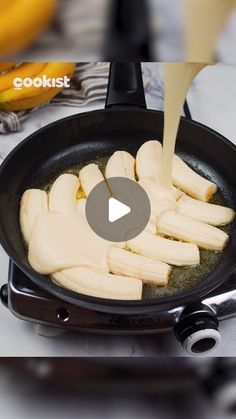 bananas being cooked in a skillet on the stove