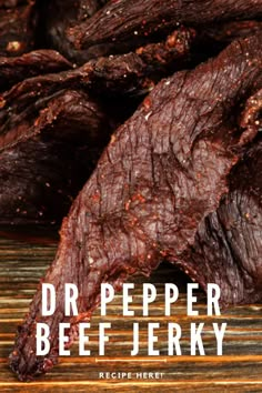 dr pepper beef jerk on a wooden table with the words dr pepper beef steak over it