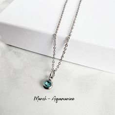 Dainty aquamarine birthstone necklace makes a perfect March birthday gift! Stainless steel will not tarnish and is great for those with sensitive skin. Perfect for everyday wear! Necklace comes on the message card, carefully packaged inside a box, ready for gift giving! Your gift can be sent directly to the recipient, with a gift message, if desired. DETAILS: * 6.5mm stainless steel birthstone charm  * 1.5mm 304 stainless steel cable chain with lobster clasp * gift ready box PROCESSING / SHIPPIN Nickel-free Necklaces For May Birthstone Gifts, Nickel-free May Birthstone Necklace For Birthdays, Nickel-free Silver Birthstone Necklace For Birthday, Silver Nickel-free Pendant Birthstone Necklace, Nickel-free Charm Necklaces For May Birthstone Gifts, March Birthday Gifts, Birthstone Charm Necklace, March Birthstone Necklace, Aquamarine Birthstone