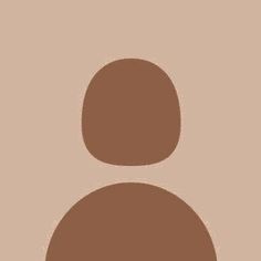 an image of a person's face in the middle of a brown and tan background