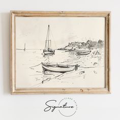 a drawing of two boats floating in the water next to each other on a wall