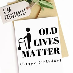 an old lives matter birthday card on top of a brown envelope with a tag attached to it