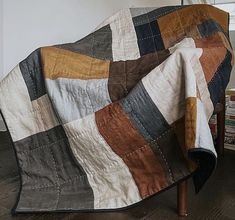 a blanket that is on top of a chair