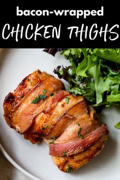 bacon wrapped chicken thighs on a white plate next to a green leafy salad with text overlay