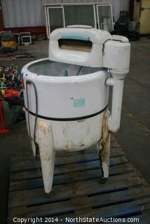 a large white tank sitting on top of a pallet