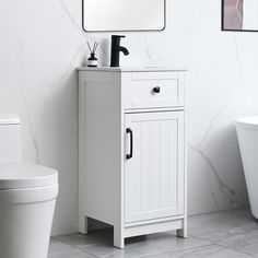 a bathroom with a toilet, sink and mirror on the wall next to a bathtub