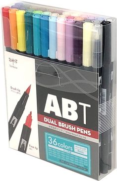 a box with markers and pens in it