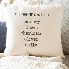 a pillow that says, we love dad harper lucas charlotte olver family on it