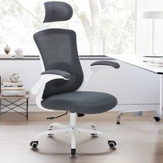 Upgrade your workspace with this premium mesh task chair, designed for ultimate comfort and versatility. Crafted from high-end breathable mesh, it keeps you cool and supported throughout the day. The ergonomic design ensures proper posture and reduces strain, making it ideal for long working hours. The thick cushion, made of high-resilience foam, provides extra comfort, while the multi-angle adjustment feature allows you to customize your seating position to suit your needs. Whether you're worki White Upholstery, Proper Posture, Inbox Zero, Task Chair, Working Hours, Ergonomics Design, Keep Your Cool, Ergonomic Design, Office Furniture