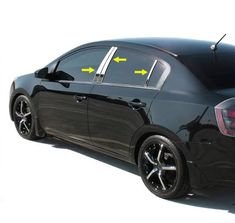 the rear end of a black car with yellow arrows pointing to it's left side