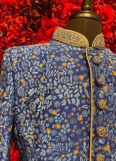 A regal blue sherwani adorned with intricate floral embroidery in gold and silver tones. The high-collared design and detailed buttons exude sophistication, making it perfect for weddings and grand celebrations. The luxurious fabric and rich embroidery make this sherwani a statement piece for any groom or special occasion. Key Features: Color: Royal blue with gold and silver floral embroidery. Design: High-collared with ornate buttons. Fabric: Rich, textured fabric for a luxurious feel. Occasion Buy Lehenga Online, Indian Bridal Couture, Blue Sherwani, Weddings Elegant, Elegant Veils, Reception Gowns, Mehendi Outfits, Bridal Store, Bridal Lehenga Red