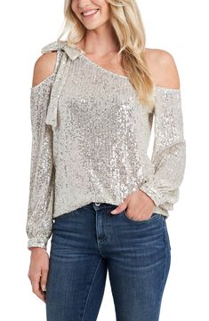 Get ready to dazzle in this sparkling, sequined top that drapes delicately from one shoulder and finishes with a feminine bow atop the other. Style Name:Cece One-Shoulder Sequin Top. Style Number: 6144594. Available in stores. Silver Sequin Top, Sequined Top, Sequin Bow, One Shoulder Top, Long Sleeve Sequin, One Shoulder Tops, Matching Family Outfits, Cold Shoulder Top, Sequin Top