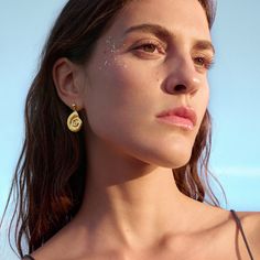 The organic sea snail shape of the Malibu earrings instantly lets the mind wander to shell hunting on wide beaches, in endless sunsets, over fire-red seas. Shell Hunting, Sea Snail, Meaningful Jewelry, Red Sea, Red Fire, Organic Shapes, The Mind, Karate, Jewelry Crafts