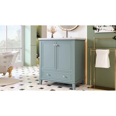 a bathroom with green and white walls, a bathtub, sink and mirror in it