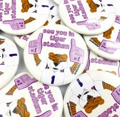 Each pin back button is 2.25 inches in diameter. These buttons are super lightweight and perfect for Game Day! Add to your outfit or a purse strap to complete your game day look. Each button is finished with a plastic coating to keep your button clean from any game day activities! Metal Backside and pin. *Original REBL Creative design* LOUISIANA LSU GEAUX TIGERS Lsu Game Day, Lsu Game, Tiger Stadium, Foam Finger, Button Maker, Geaux Tigers, Plastic Coating, Halloween News, Purse Strap