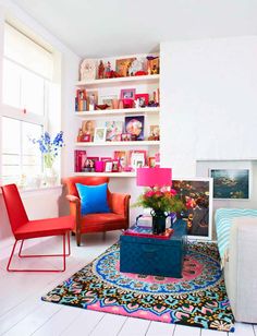 a living room filled with furniture and decor