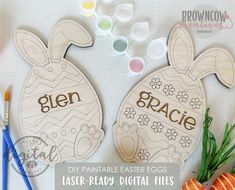 two wooden easter eggs with the words glien and grace on them next to carrots