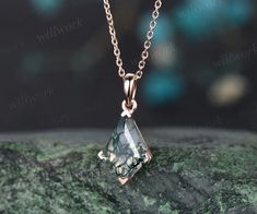 ***The elegant kite-shaped moss agate necklace is designed with minimal style and needs no extras. Sometimes less is more. This necklace is the perfect example.***- Metal: Solid gold(9K/14K/18K white/yellow/rose gold),925 sterling silver,platinum available- Main Stone: 7x10mm kite cut natural moss agate- Chain: 16+2 inches. The chain can be adjustable to 18 Inches.- Can be personalized: Yes Moss Agate Necklace, Topaz Birthstone, Bee Ring, Handmade Fine Jewelry, All Gems, Pendant For Women, Personalized Pendant, Bridal Gift, Agate Necklace