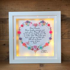 a heart shaped frame with flowers on it and a poem written in the center that reads, best friends