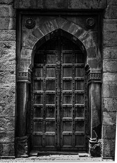 black and white photograph of an old door