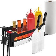 an image of kitchen utensils and condiments in holder