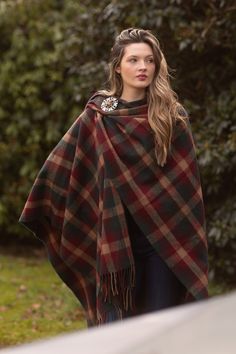 This is our EXTRA WARMTH Collection. It's ideal if you feel the cold or live in a chilly climate. Our Highlander Ruana (pronounced roo-AH-nah) is a traditional, easy-to-wear style that exudes vibrant colour, heritage and tradition. If you love the 'Outlander' style, this is a must-have for your wardrobe! 85% Soft, natural lambswool plus 15% recycled tartan fibre blend for extra warmth Made to traditional standards in the Scottish Highlands Registered Tartans One Size - Generous UK8 - 24 | USA 4 - 18 Choose to add a traditional brooch closure or drape it over your shoulder. Please beware of poor quality, scratchy imitations. Colours may render slightly differently between each weave. The Ruana Dimensions are a very generous 142cm x 180cm (4'8" x 5'11") *Brooch not included Traditional Scottish Clothing, Wizarding Fashion, Outlander Style, European Chic, Scottish Women, Scottish Clothing, Wild Party, Great Scot, Scottish Fashion