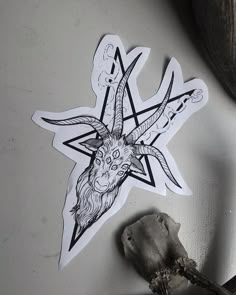 a sticker with a goat head on it