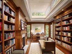 a living room filled with lots of books