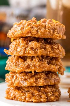 three cookies stacked on top of each other with one cookie in the middle and two are made out of oatmeal