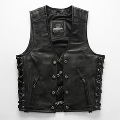 Motorcycle Enthusiasts! Want to create a layered outfit? The V-Neck Chain Genuine Leather Vest is a good choice for you. Because wearing a leather vest will expose your underlying shirt or top. A long sleeve shirt or sweatshirt with a good vest is enough to keep you warm when riding in cold temperatures. Features: 2.75-3.0 oz (1.1-1.2 mm) medium weight Cowhide Premium Leather shell Front button-chain closure Twin side pockets with zippers Reinforced armholes are big enough Smooth mesh poly-cotto 80s Metalhead, Masc Goth, Leather Gilet, Layered Outfit, Motorcycle Jeans, Motorcycle Pants, Denim Vests, Motorcycle Vest, Open Face Helmets