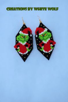 My very favorite holiday movie is The Grinch Who Stole Christmas, so of course, I had to make these Grinch earrings! They are hand-beaded using high quality glass Delica beads and needle with thread. The length (including the gold-filled ear-wires) is 3 1/4" - they are 1 1/4" wide.  I used brick stitch to make them and made sure to reinforce the top loop so they will last for many years. My pictures don't do them justice, they are adorable! * Ready to Ship - Rush Shipping is Available at Check-o Seed Bead Grinch Earrings, Grinch Earrings Beaded, Grinch Seed Bead Earrings, Grinch Beaded Earrings, Dr Seuss Earrings, Seed Bead Christmas Earrings, Bead Christmas Earrings, Seed Bead Christmas, Grinch Earrings