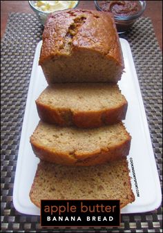 three slices of banana bread stacked on top of each other with the words apple butter in front of them