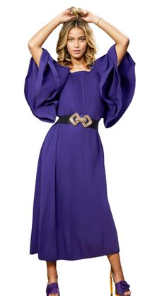 This stunning Purple Flutter Sleeve Dress features layered flutter sleeves, adding a touch of elegance and femininity to your look. The rich purple hue makes a statement while the flutter sleeves provide a subtle and stylish touch. Perfect for any special occasion, this dress is sure to turn heads. Purple Midi Dress For Wedding Guest, Chic Pleated Dress With Ruffle Sleeves, Chic Flutter Sleeve Cocktail Dresses, Chic Party Dress With Butterfly Sleeves, Chic Cocktail Dress With Flutter Sleeves, Pleated Ruffle Sleeve Party Dresses, Pleated Party Dresses With Ruffle Sleeves, Elegant Purple Midi Dress For Party, Elegant Purple Midi Dress For Wedding Guest