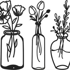 three vases with flowers in them