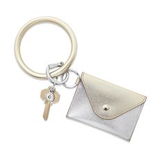 The Mini Envelope Wallet is an ultra-luxe, snap closure leather wallet with a snug, central compartment and an envelope flap top. As functional as it is cute, this mighty mini can hold an ID, multiple cards, and folded cash. Outfitted with an attached split ring, the Mini Envelope can be hooked onto a Big O® Key Ring for hands-free simplicity. Key Features: Crafted from genuine leather Holds ID, credit cards and cash Single compartment design Secure logo snap closure Measures 4.25 x 3 inches Spl Mini Envelope, Big O, Designer Wallet, Coffee With Friends, Envelope Card, Mini Envelopes, Envelope Wallet, Keychain Wallet, Envelope Design