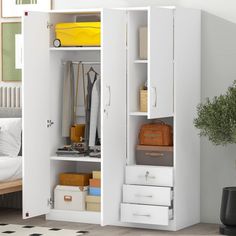 a white closet with drawers and shelves filled with items next to a bed in a bedroom