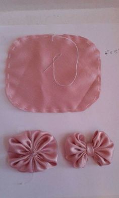 two pink hair bows, one with a knot on it