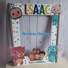 a wooden frame with various cartoon characters on it and the word asac above it