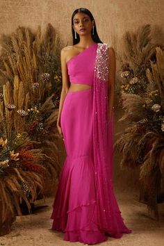 Shop for Shloka Khialani Pink Net Cutout One Shoulder Gown With Dupatta for Women Online at Aza Fashions Pink Mehendi Outfit, Hot Pink Indian Outfit, Shloka Khialani, Pink Indian Outfit, Gown With Dupatta, Cutout Gown, Georgette Lehenga, Traditional Indian Outfits, Indian Gowns